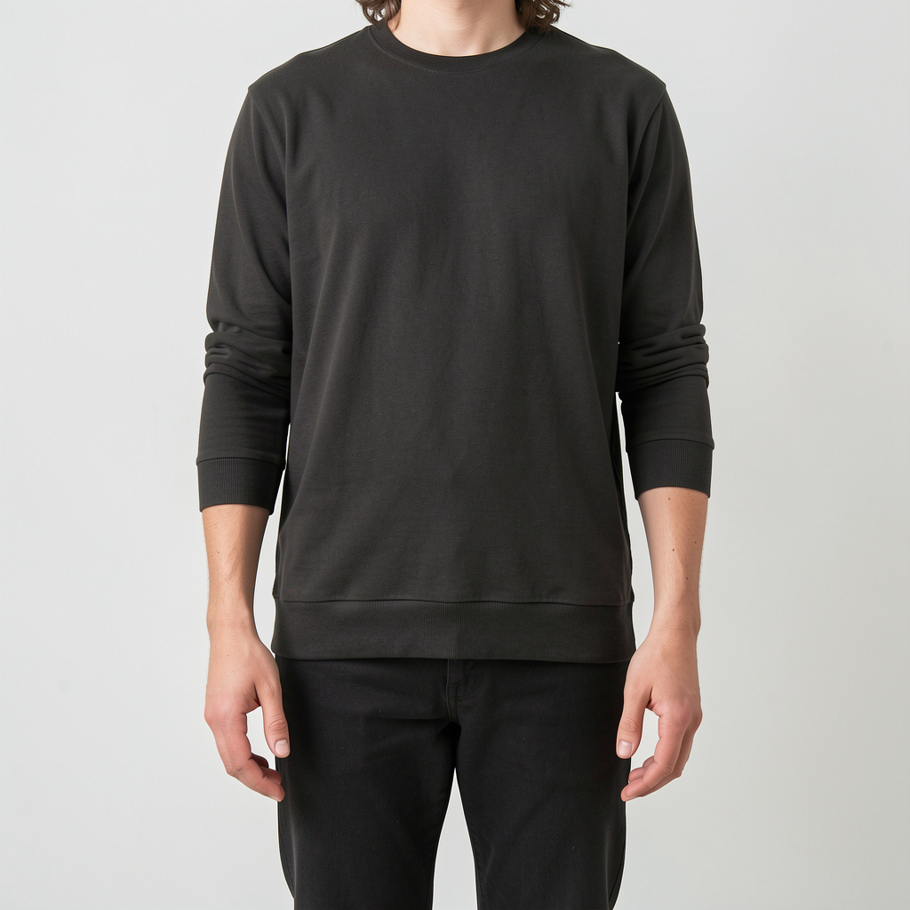 A person standing with both hands visible at their sides, fi