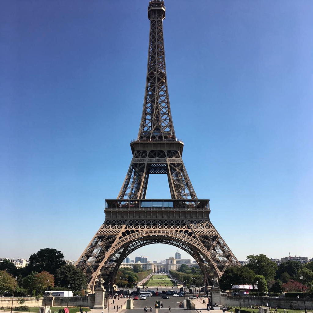 The Eiffel Tower in Paris on a clear day, architecturally ac