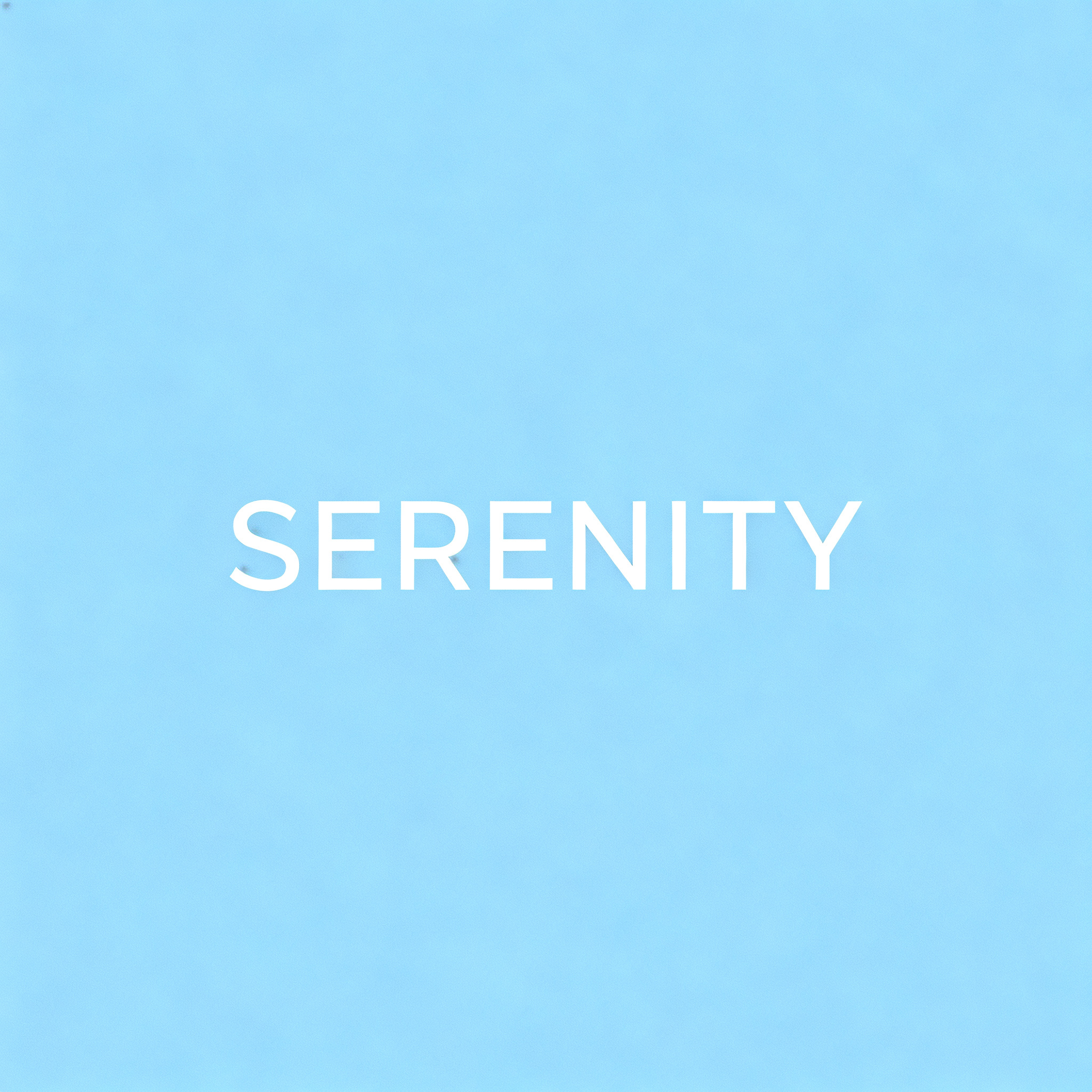 The word 'SERENITY' written large and centered on a solid li