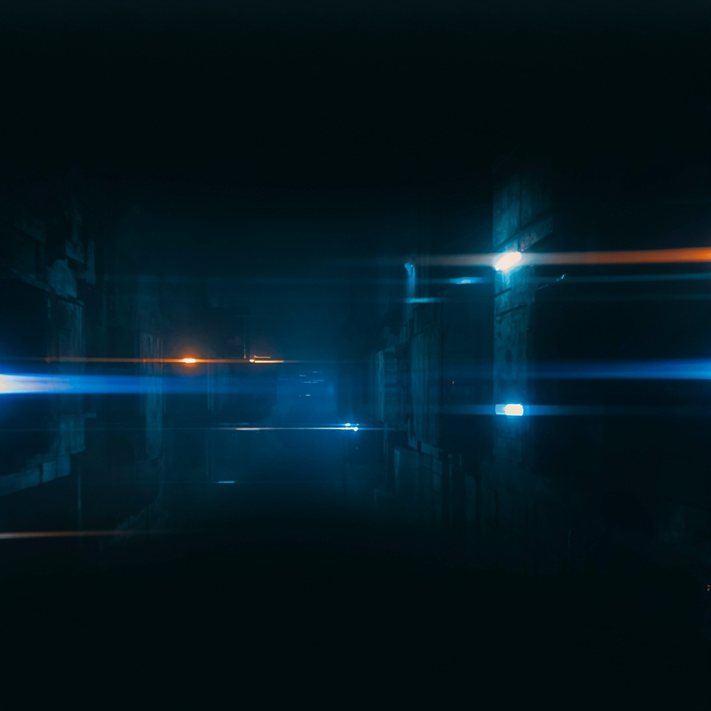 A cinematic frame with blue and orange anamorphic lens flare