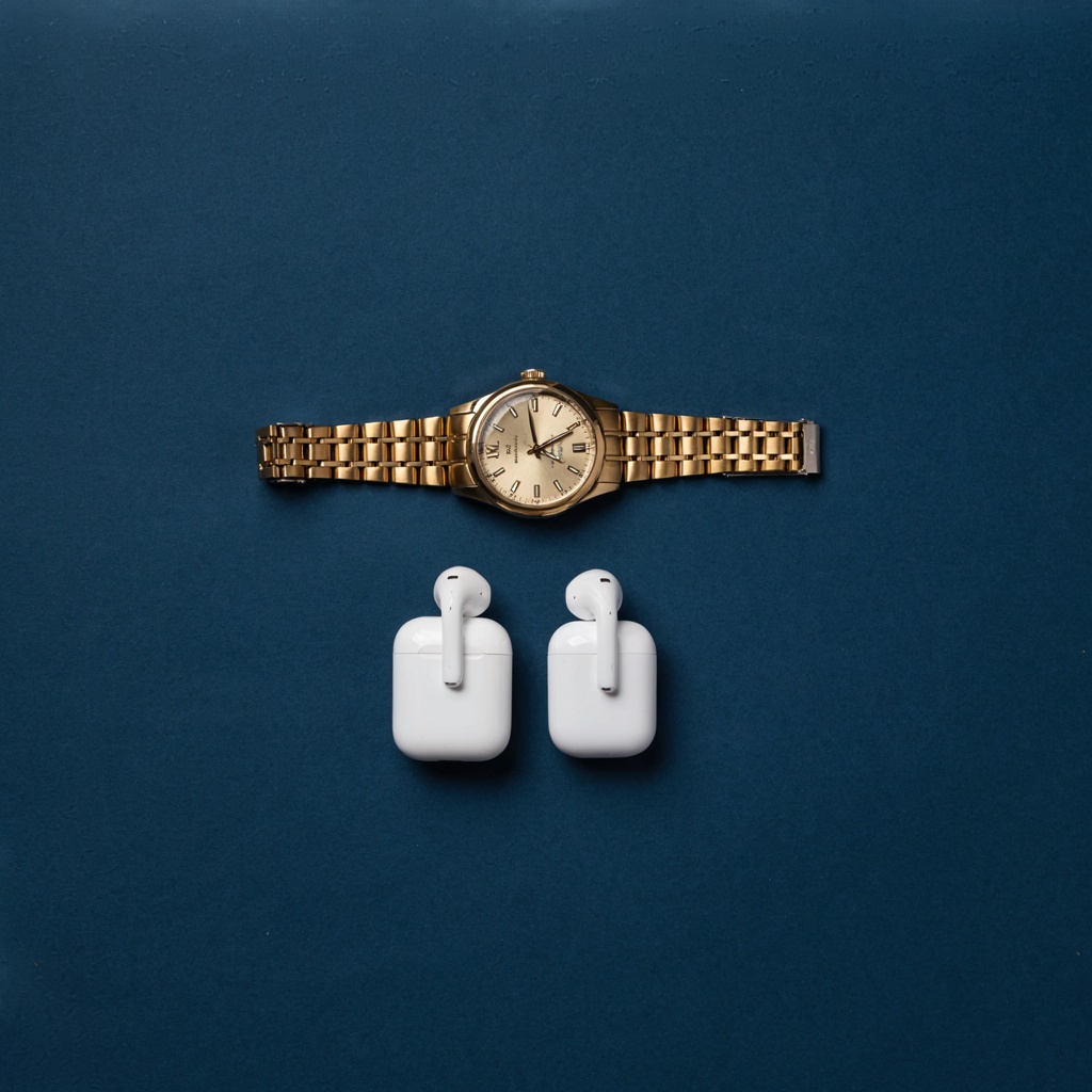 A product flat-lay on a #1A1A2E (deep dark blue) background,