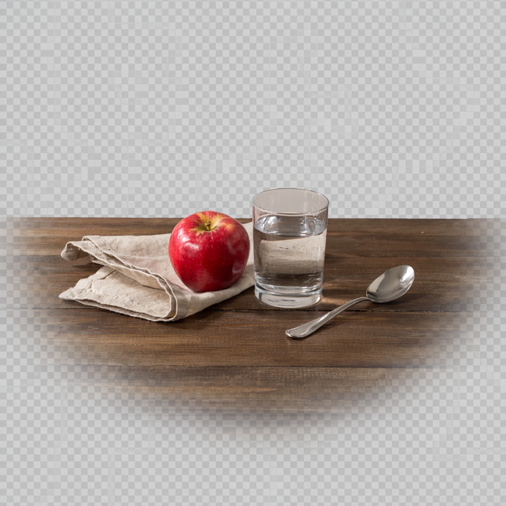 A still life on a wooden table featuring a clear glass of wa