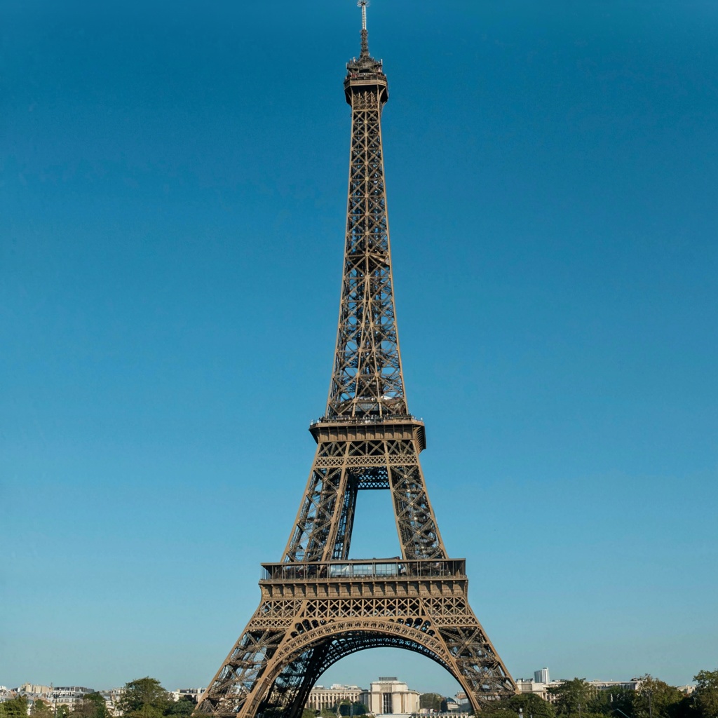The Eiffel Tower in Paris on a clear day, architecturally ac