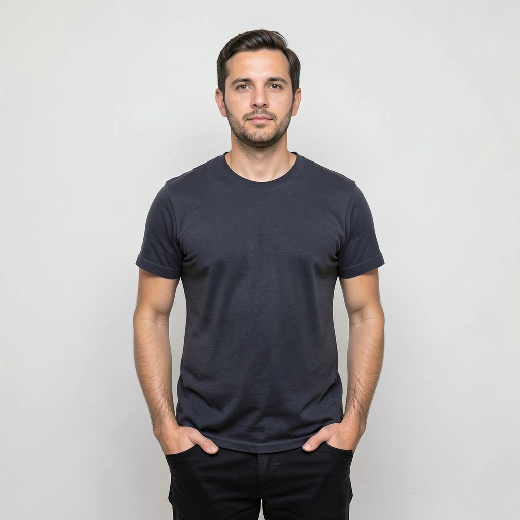 A man standing straight facing the camera, hands in pockets,